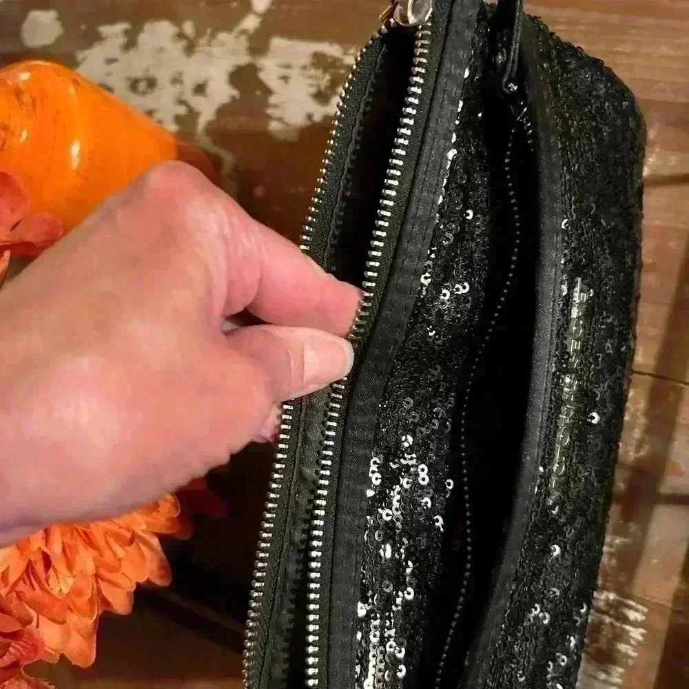 Victoria’s Secret black and silver sequined clutch, make up bag